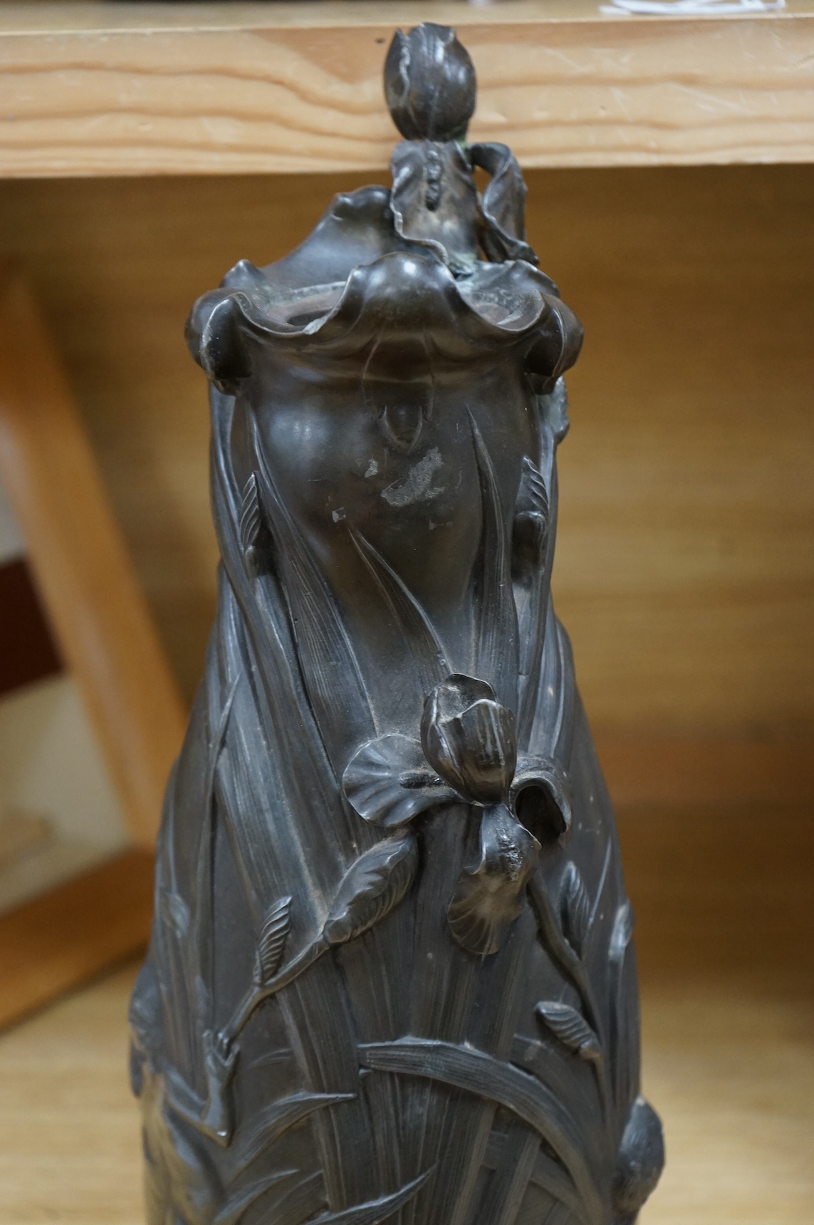 An Art Nouveau large pewter ewer, singed W. Herring, 47cm tall. Condition - poor
